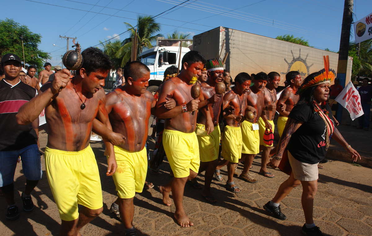 Indigenous people protesting against the Belo Monte mega-dam on the Xingu River in the Amazon, Brazil. If completed, the dam will be the third largest in the world and thousands of tribal peoples' livelihoods could be destroyed, as they depend upon the forest and river for food and water.