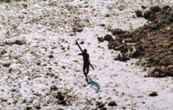 In the wake of the 2004 tsunami this member of the Sentinelese tribe was photographed firing arrows at a helicopter.