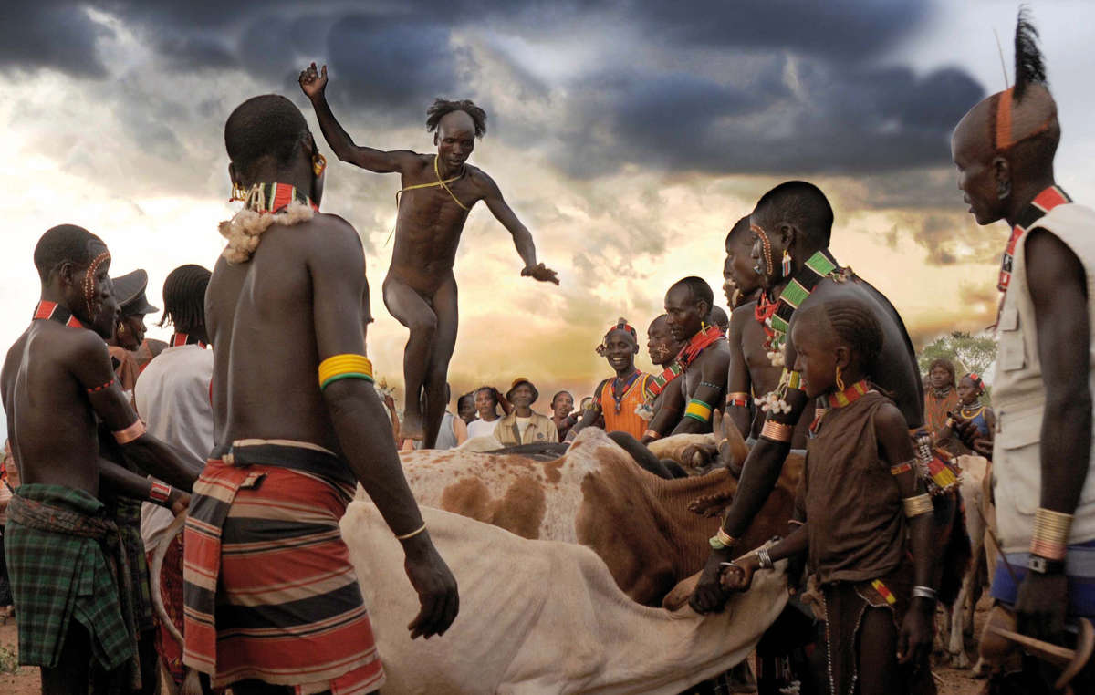 One of the runners-up: a Hamer man in Ethiopia's Omo Valley skilfully jumping over a row of bulls as part of a wedding ceremony.